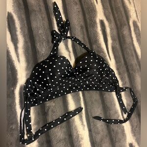 This is a polka dot swim top.